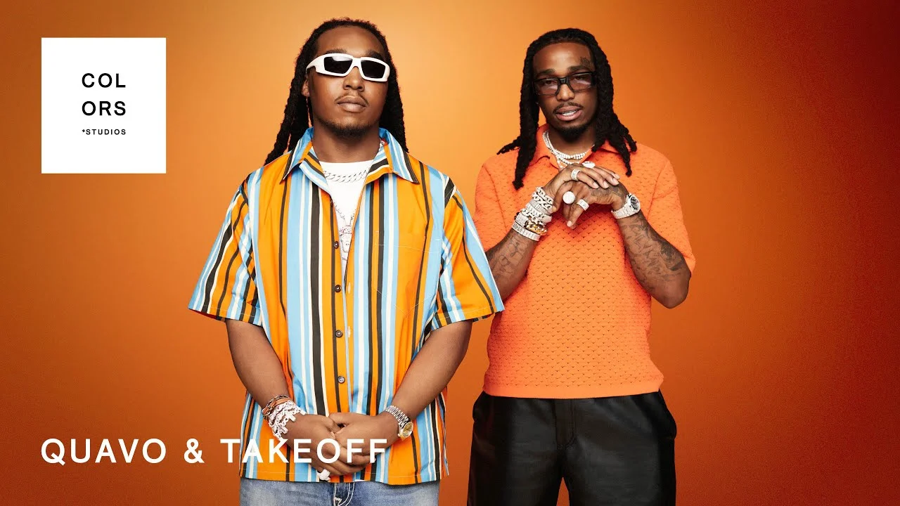 Quavo 和 Takeoff 的 HOTEL LOBBY 官方 COLORS 表演缩略图，橙色背景前站着两位表演者